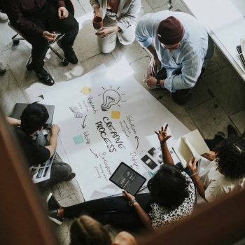 business-people-brainstorming-ideas-using-a-chart.jpg business-people-brainstorming-ideas-using-a-chart.jpg